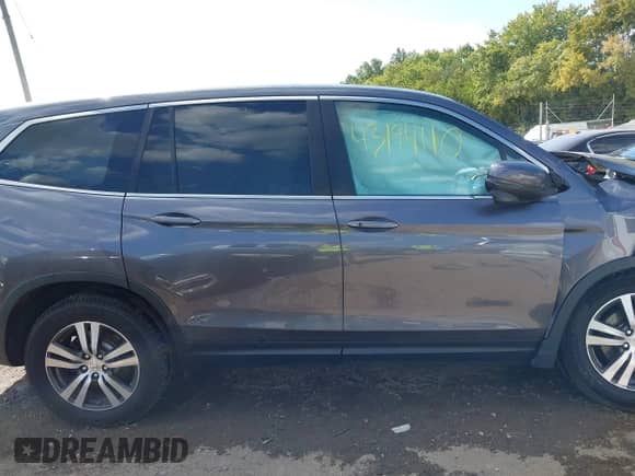2018 Honda Pilot EX-L z VIN 5FNYF6H85JB024991, wystawiony jako IAAI lot #43194110 z przebiegiem 98 862 mil mil oraz . Historia ofert i sprzedaży dostępna na DreamBid. Obrazek 13.