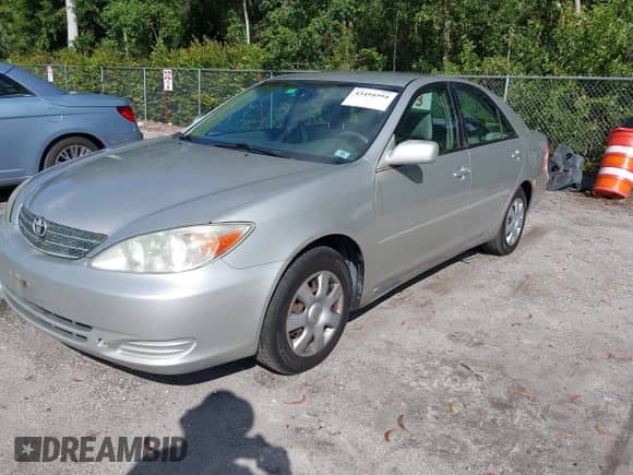 2004 Toyota Camry LE z VIN 4T1BE30K44U848146, wystawiony jako IAAI lot #43494594 z przebiegiem 178 160 mil mil oraz . Historia ofert i sprzedaży dostępna na DreamBid. Obrazek 13.