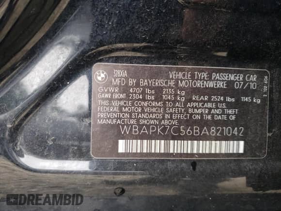 2011 BMW 3 Series 328i xDrive with VIN WBAPK7C56BA821042, listed as a Copart auction lot 67367925 with 135,459 mi miles and Salvage title. Bid and sale history available at DreamBid. Image 12.