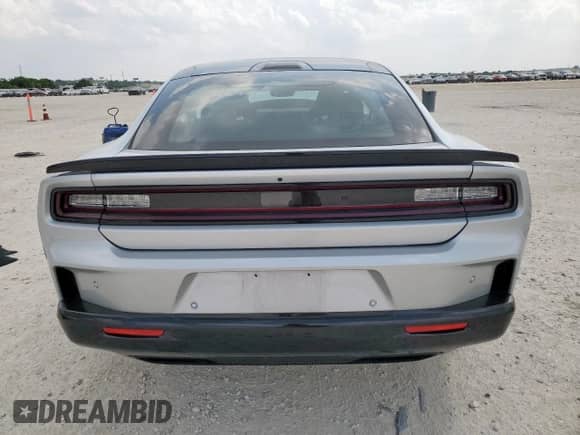 2024 Dodge Charger Scat Pack с VIN 2C3CDBDK6RR208111, выставлен на аукционе Copart как лот 58274025 с пробегом 962 миль миль и Списание • Salvage title. История ставок и продаж доступна на DreamBid. Изображение 6.