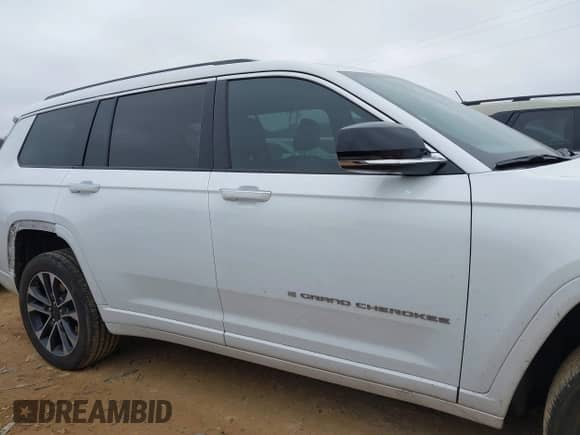 2023 Jeep Grand Cherokee Overland with VIN 1C4RJKDT9P8107466, listed as a IAAI auction lot 41428743 with 34,317 mi miles and . Bid and sale history available at DreamBid. Image 13.