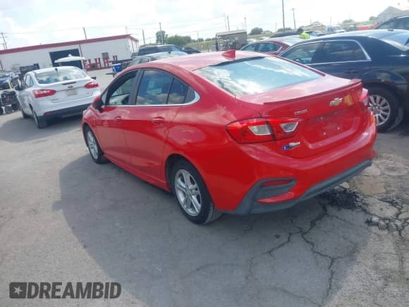 2018 Chevrolet Cruze LT with VIN 1G1BE5SM6J7205217, listed as a IAAI auction lot 43413199 with 95,771 mi miles and . Bid and sale history available at DreamBid. Image 3.