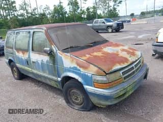 1993 Dodge Caravan with VIN 2B4GH2531PR318549, listed as a IAAI auction lot 43032590 with 245,192 mi miles and . Bid and sale history available at DreamBid. Image 1.