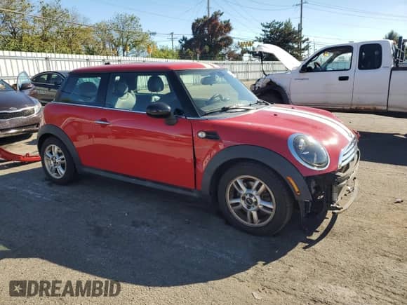 2013 MINI Hardtop with VIN WMWSU3C52DT370051, listed as a Copart auction lot 82431165 with 68,570 mi miles and Salvage title. Bid and sale history available at DreamBid. Image 4.