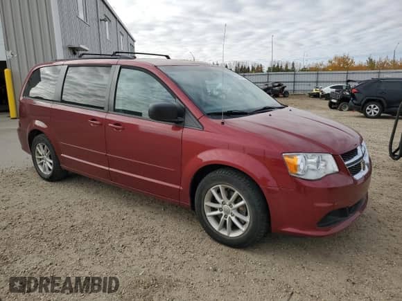 2015 Dodge Grand Caravan American Value with VIN 2C4RDGBG5FR647541, listed as a Copart auction lot 85539445 with 148,285 mi miles and Salvage title. Bid and sale history available at DreamBid. Image 4.