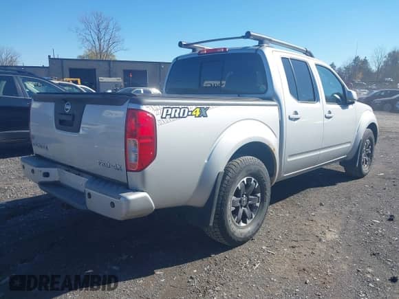 2014 Nissan Frontier S with VIN 1N6AD0EV3EN767670, listed as a IAAI auction lot 43559431 with 127,853 mi miles and . Bid and sale history available at DreamBid. Image 4.