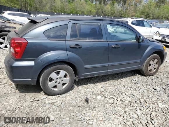2007 Dodge Caliber with VIN 1B3HB28B87D233112, listed as a Copart auction lot 53991115 with 149,902 mi miles and Salvage title. Bid and sale history available at DreamBid. Image 3.