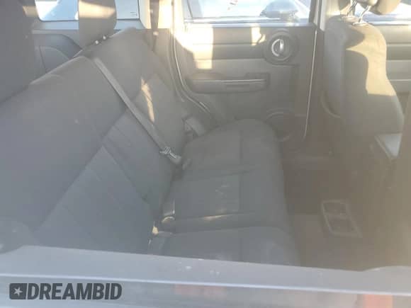 2011 Dodge Nitro SE с VIN 1D4PT2GK1BW587062, выставлен на аукционе Copart как лот 77384584 с пробегом 120 977 миль миль и На запчасти • Non repairable. История ставок и продаж доступна на DreamBid. Изображение 11.