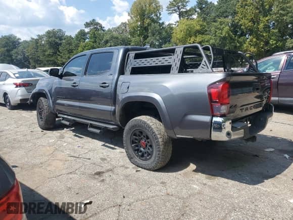 2021 Toyota Tacoma SR with VIN 3TMCZ5AN3MM416508, listed as a Copart auction lot 70862725 with 73,141 mi miles and Salvage title. Bid and sale history available at DreamBid. Image 2.