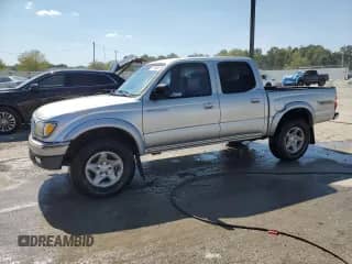2002 Toyota Tacoma PreRunner with VIN 5TEGM92N02Z034295, listed as a Copart auction lot 71456425 with 194,183 mi miles and Salvage title. Bid and sale history available at DreamBid. Image 1.