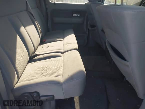 2007 Ford F-150 XLT with VIN 1FTRW12W97KA45353, listed as a IAAI auction lot 43070079 with 291,301 mi miles and . Bid and sale history available at DreamBid. Image 8.