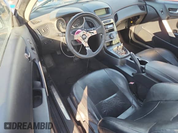 2010 Hyundai Genesis Coupe Grand Touring с VIN KMHHU6KHXAU011302, выставлен на аукционе Copart как лот 86188445 с пробегом 159 858 миль миль и Чистый • Clean title. История ставок и продаж доступна на DreamBid. Изображение 8.