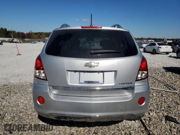 2012 Chevrolet Captiva Sport LTZ z VIN 3GNFL4E56CS594174, wystawiony jako Copart lot #74492554 z przebiegiem 129 625 mil mil oraz Czysty tytuł • Clean title. Historia ofert i sprzedaży dostępna na DreamBid. Obrazek 6.