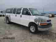 2007 Chevrolet Express Passenger with VIN 1GAHG39UX71101095, listed as a Copart auction lot 41585775 with 356,651 mi miles and Salvage title. Bid and sale history available at DreamBid. Image 4.