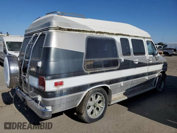 1989 Chevrolet Chevy Van с VIN 1GBEG25KXK7127909, выставлен на аукционе Copart как лот 59997315 с пробегом 550 289 миль миль и Чистый • Clean title. История ставок и продаж доступна на DreamBid. Изображение 3.