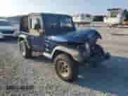 1997 Jeep Wrangler SE z VIN 1J4FY29PXVP437267, wystawiony jako Copart lot #69390955 z przebiegiem 151 349 mil mil oraz Czysty tytuł • Clean title. Historia ofert i sprzedaży dostępna na DreamBid. Obrazek 4.
