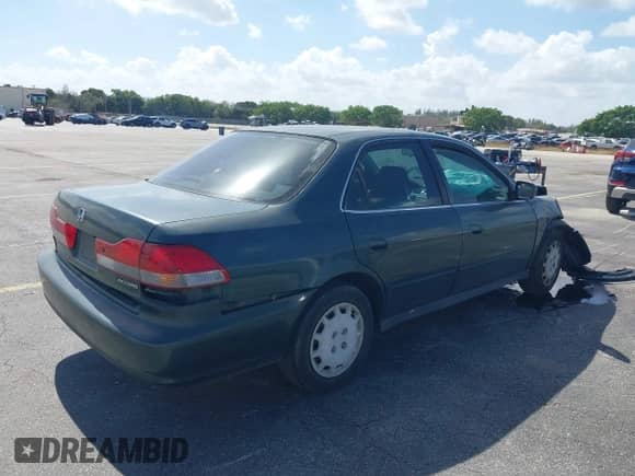 2002 Honda Accord LX with VIN 3HGCG56472G702283, listed as a IAAI auction lot 41579638 with 178,396 mi miles and . Bid and sale history available at DreamBid. Image 4.