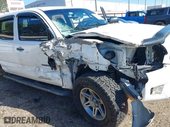 2013 Toyota Tacoma PreRunner with VIN 3TMKU4HN8DM038566, listed as a IAAI auction lot 41296386 with 153,240 mi miles and . Bid and sale history available at DreamBid. Image 6.