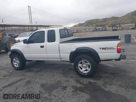 2001 Toyota Tacoma с VIN 5TEWN72N11Z820568, выставлен на аукционе IAAI как лот 41820146 с пробегом 188 430 миль миль и . История ставок и продаж доступна на DreamBid. Изображение 13.