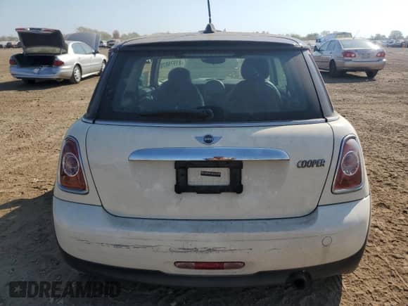 2012 MINI Hardtop с VIN WMWSU3C52CT260986, выставлен на аукционе Copart как лот 81976875 с пробегом 130 257 миль миль и Списание • Salvage title. История ставок и продаж доступна на DreamBid. Изображение 6.