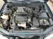 1995 Toyota Camry z VIN 4T1GK12C3SU069519, wystawiony jako Copart lot #72762244 z przebiegiem 226 788 mil mil oraz Szkoda całkowita • Salvage title. Historia ofert i sprzedaży dostępna na DreamBid. Obrazek 11.