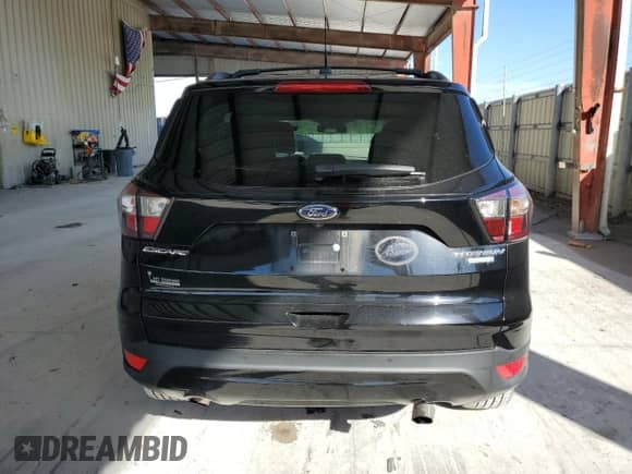 2017 Ford Escape Titanium с VIN 1FMCU0JD0HUE43705, выставлен на аукционе Copart как лот 85735815 с пробегом 69 800 миль миль и Списание • Salvage title. История ставок и продаж доступна на DreamBid. Изображение 6.