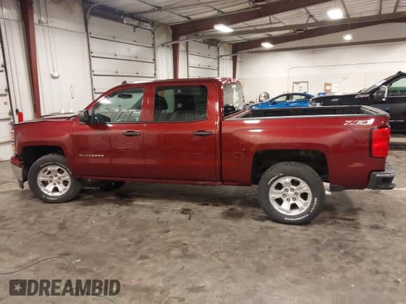 2014 Chevrolet Silverado 1500 LT with VIN 3GCUKREC4EG339740, listed as a IAAI auction lot 42933250 with 168,499 mi miles and . Bid and sale history available at DreamBid. Image 15.