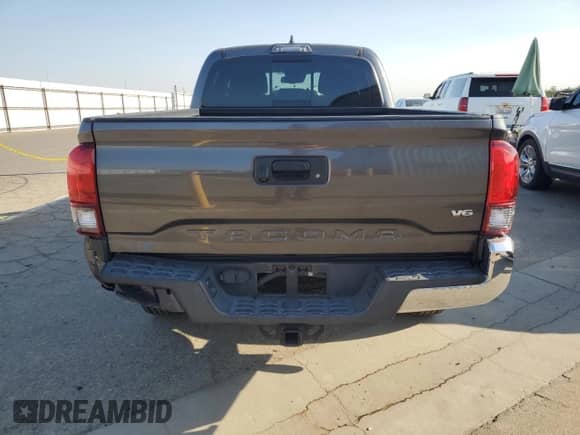 2019 Toyota Tacoma SR5 with VIN 3TMBZ5DN5KM019662, listed as a Copart auction lot 71650075 with 105,601 mi miles and Salvage title. Bid and sale history available at DreamBid. Image 6.