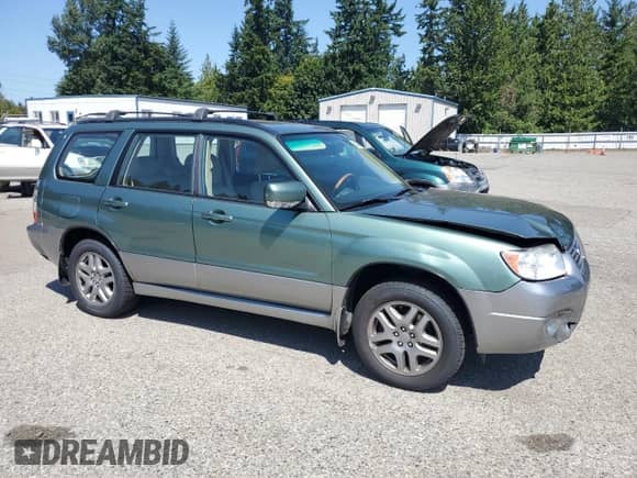 2007 Subaru Forester X L.L. Bean with VIN JF1SG676X7H747088, listed as a Copart auction lot 62539065 with 125,677 mi miles and Salvage title. Bid and sale history available at DreamBid. Image 4.