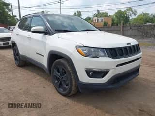 2019 Jeep Compass Latitude with VIN 3C4NJDBB6KT792170, listed as a IAAI auction lot 42636625 with 58,300 mi miles and . Bid and sale history available at DreamBid. Image 1.