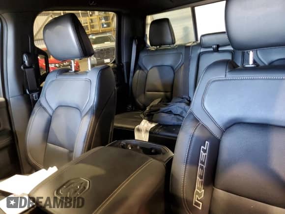 2023 Ram 1500 Rebel z VIN 1C6SRFLT7PN670947, wystawiony jako Copart lot #71454064 z przebiegiem 17 100 mil mil oraz Szkoda całkowita • Salvage title. Historia ofert i sprzedaży dostępna na DreamBid. Obrazek 10.