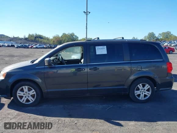 2012 Dodge Grand Caravan Crew z VIN 2C4RDGDG1CR123361, wystawiony jako IAAI lot #43418401 z przebiegiem 169 040 mil mil oraz . Historia ofert i sprzedaży dostępna na DreamBid. Obrazek 6.