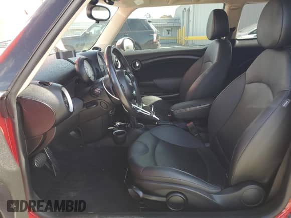 2011 MINI Hardtop S with VIN WMWSV3C50BTY12562, listed as a Copart auction lot 61183425 with 125,126 mi miles and Salvage title. Bid and sale history available at DreamBid. Image 7.