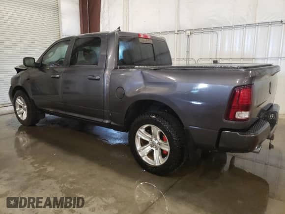 2014 Ram 1500 Sport with VIN 1C6RR7MT1ES374811, listed as a Copart auction lot 67714065 with 101,296 mi miles and Salvage title. Bid and sale history available at DreamBid. Image 2.