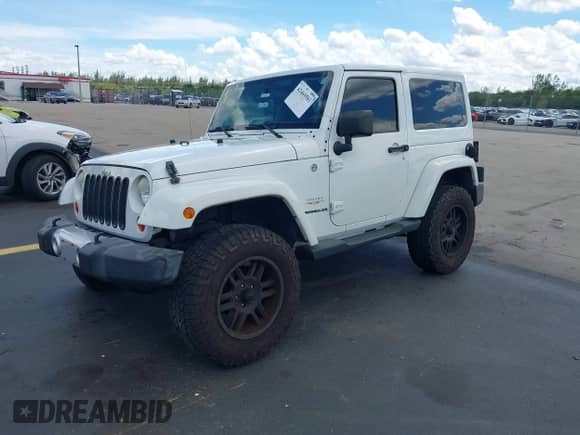 2012 Jeep Wrangler Arctic with VIN 1C4AJWBG2CL229653, listed as a IAAI auction lot 42469581 with 85,293 mi miles and . Bid and sale history available at DreamBid. Image 2.