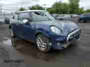2016 MINI Hardtop with VIN WMWXP5C58G3B76219, listed as a Copart auction lot 57879225 with 94,245 mi miles and Salvage title. Bid and sale history available at DreamBid. Image 4.
