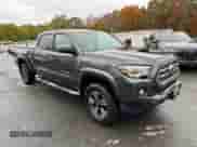 2017 Toyota Tacoma TRD Off Road z VIN 3TMDZ5BNXHM023386, wystawiony jako Copart lot #90888765 z przebiegiem 193 045 mil mil oraz Czysty tytuł • Clean title. Historia ofert i sprzedaży dostępna na DreamBid. Obrazek 4.