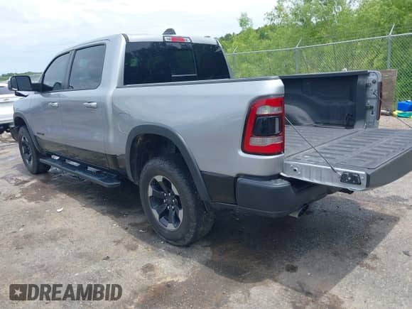 2020 Ram 1500 Rebel with VIN 1C6SRFLT8LN229872, listed as a IAAI auction lot 42135383 with 71,741 mi miles and . Bid and sale history available at DreamBid. Image 3.