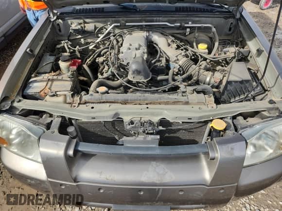 2003 Nissan Frontier SVE with VIN 1N6MD29Y53C459115, listed as a Copart auction lot 82414675 with 146,869 mi miles and Clean title. Bid and sale history available at DreamBid. Image 11.