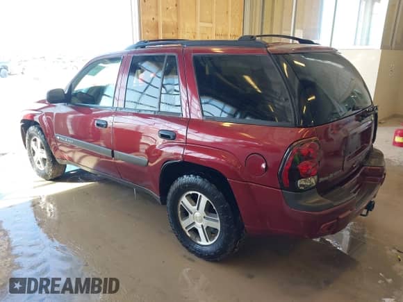 2004 Chevrolet TrailBlazer LS with VIN 1GNDT13S542446593, listed as a IAAI auction lot 41618585 with 178,284 mi miles and . Bid and sale history available at DreamBid. Image 3.