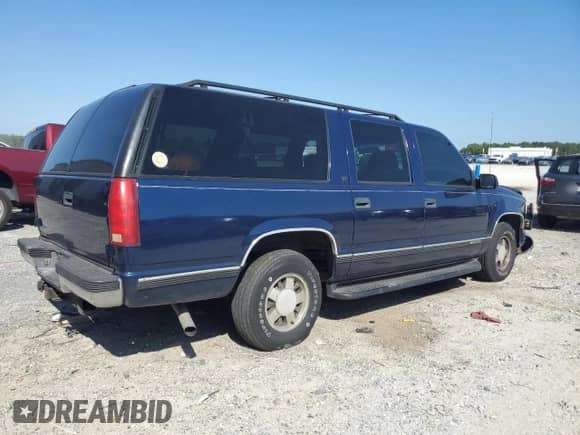 1999 Chevrolet Suburban with VIN 1GNEC16RXXJ381103, listed as a Copart auction lot 80702955 with 169,904 mi miles and Salvage title. Bid and sale history available at DreamBid. Image 3.