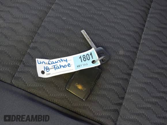 2018 Chevrolet Tahoe Commercial z VIN 1GNSKFECXJR201692, wystawiony jako IAAI lot #41606352 z przebiegiem 36 882 mil mil oraz . Historia ofert i sprzedaży dostępna na DreamBid. Obrazek 11.