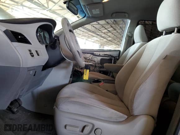 2012 Toyota Sienna LE with VIN 5TDKK3DC8CS195291, listed as a Copart auction lot 67239705 with 70,354 mi miles and Salvage title. Bid and sale history available at DreamBid. Image 7.
