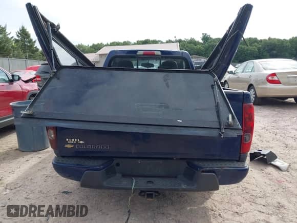 2009 Chevrolet Colorado Work Truck z VIN 1GCCS149398137275, wystawiony jako IAAI lot #43109036 z przebiegiem 159 580 mil mil oraz . Historia ofert i sprzedaży dostępna na DreamBid. Obrazek 16.