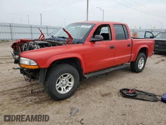 2002 Dodge Dakota SLT with VIN 1B7HG48N52S518425, listed as a Copart auction lot 67229505 with 119,119 mi miles and Salvage title. Bid and sale history available at DreamBid. Image 1.