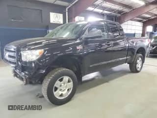 2012 Toyota Tundra with VIN 5TFUY5F1XCX223679, listed as a Copart auction lot 81509865 with 265,216 mi miles and Clean title. Bid and sale history available at DreamBid. Image 1.