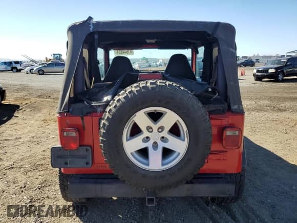 2001 Jeep Wrangler SE with VIN 1J4FA29P91P367534, listed as a Copart auction lot 81644824 with 156,597 mi miles and Clean title. Bid and sale history available at DreamBid. Image 6.