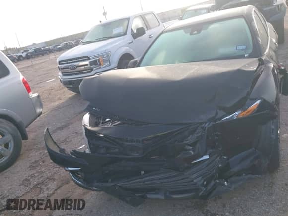 2021 Toyota Camry Hybrid XLE with VIN 4T1F31AK6MU547694, listed as a IAAI auction lot 42618333 with 18,489 mi miles and . Bid and sale history available at DreamBid. Image 6.