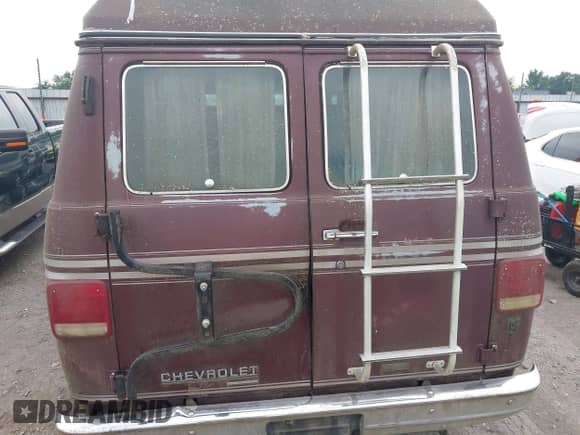 1989 Chevrolet Chevy Van with VIN 1GBEG25K5K7184695, listed as a IAAI auction lot 42432728 with 945,928 mi miles and . Bid and sale history available at DreamBid. Image 6.