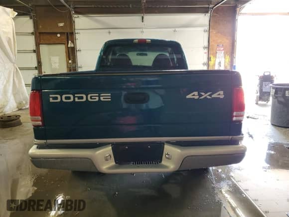 1999 Dodge Dakota SLT z VIN 1B7GG22Y5XS203084, wystawiony jako Copart lot #59273975 z przebiegiem 172 017 mil mil oraz Szkoda całkowita • Salvage title. Historia ofert i sprzedaży dostępna na DreamBid. Obrazek 6.